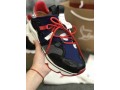 christian-louboutin-blue-neoprene-red-runner-sneaker-small-1